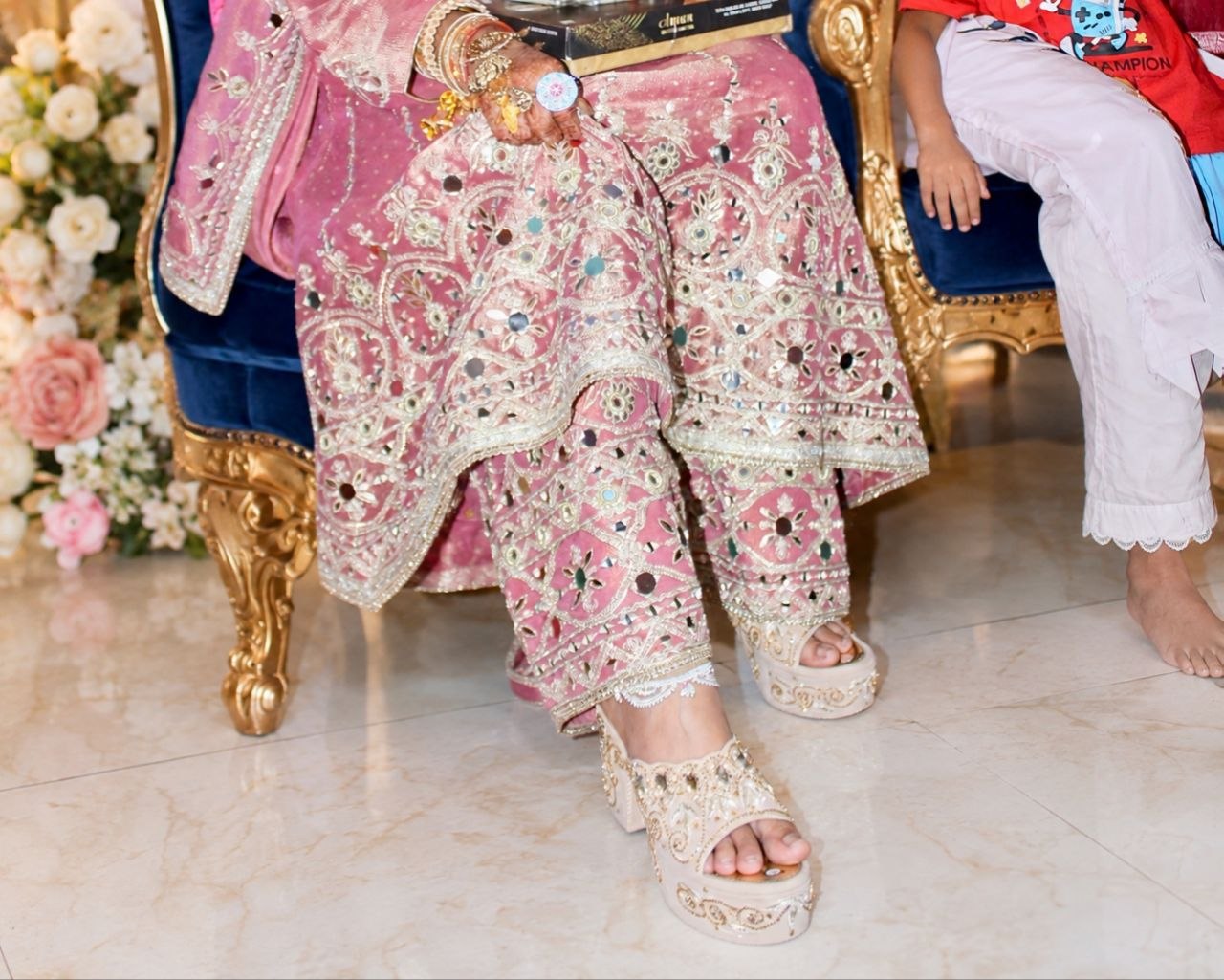 Bridal outfit and embellished footwear details